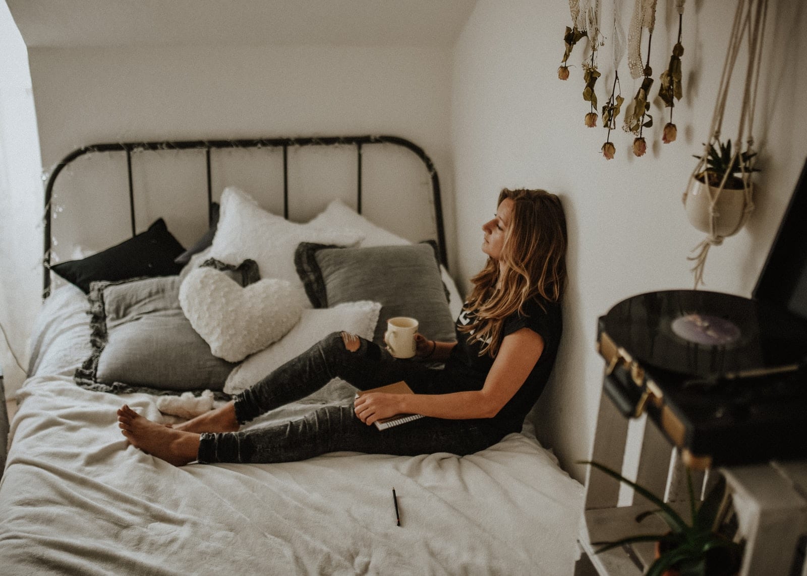 Woman Laying in Bed Thinking