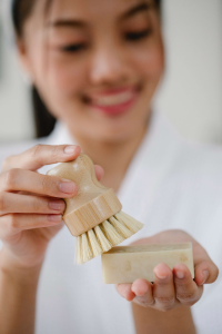 Asian woman trying Environmentally Friendly Products