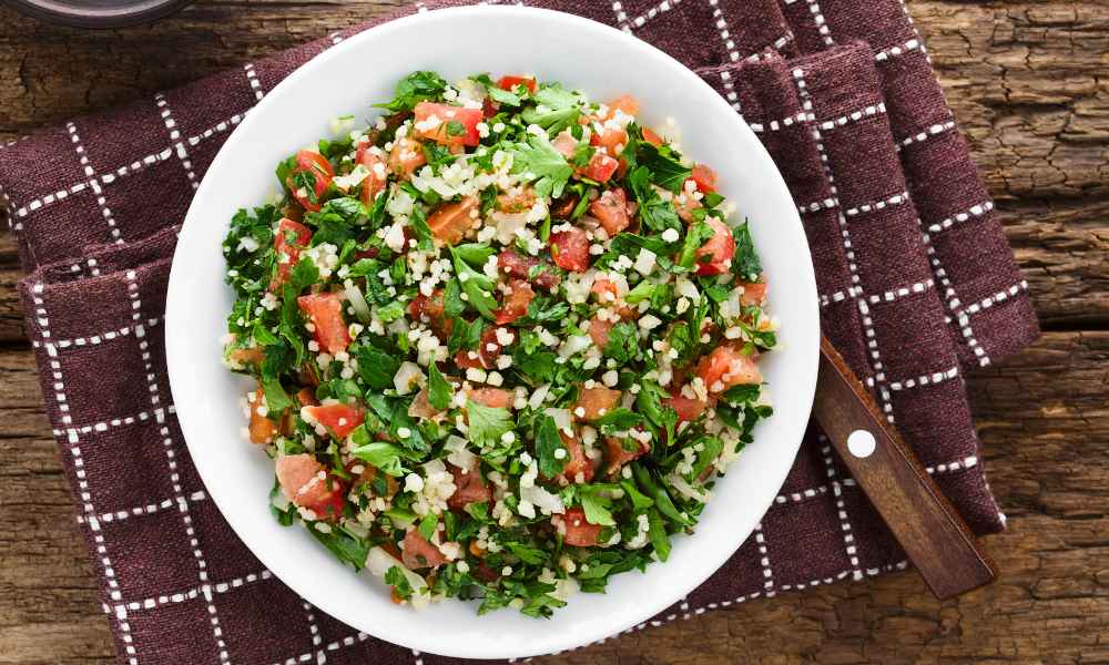 Tabbouleh salad on bowl.