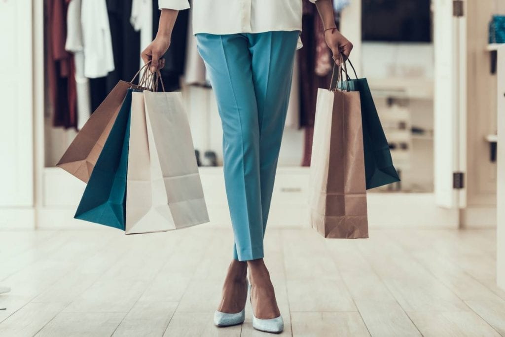 Items for Sale: Woman with Shopping Bags