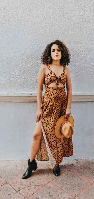 Women on a leopard two piece set and some black boots