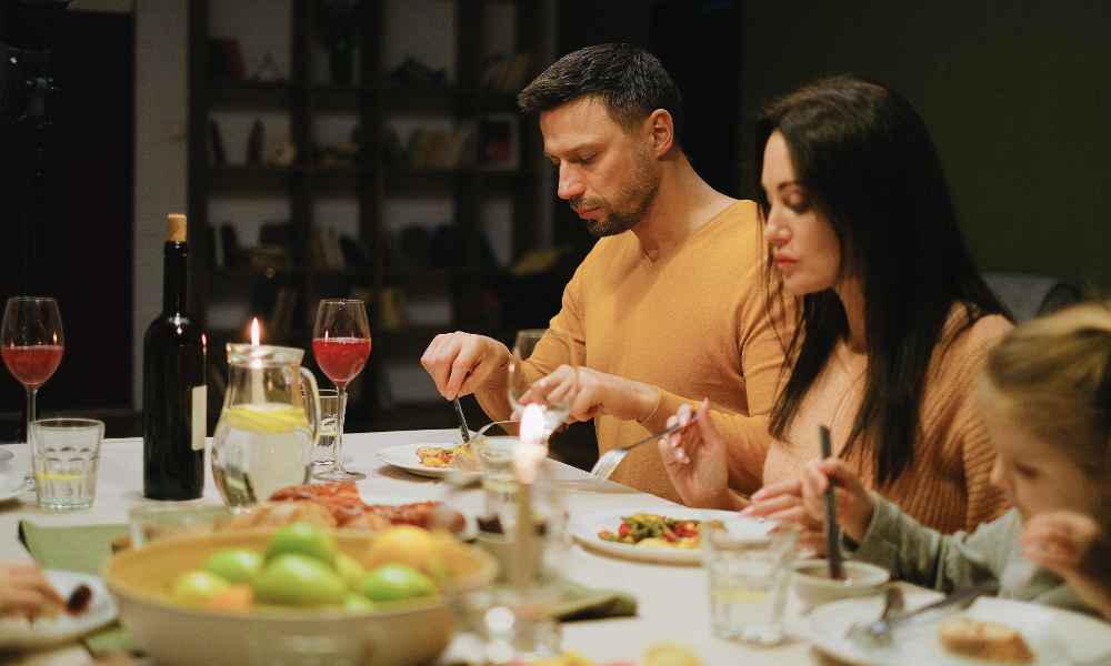 Family eating dinner.