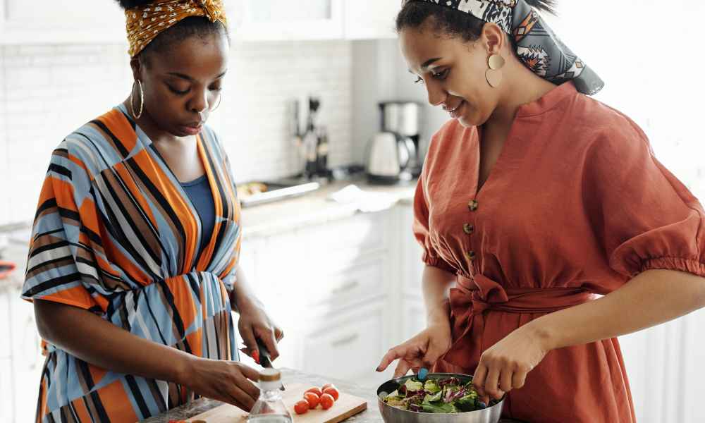 Women preparing dinner.