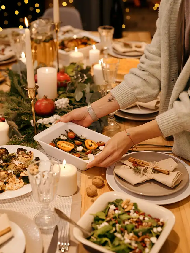 a person holding a tray of food