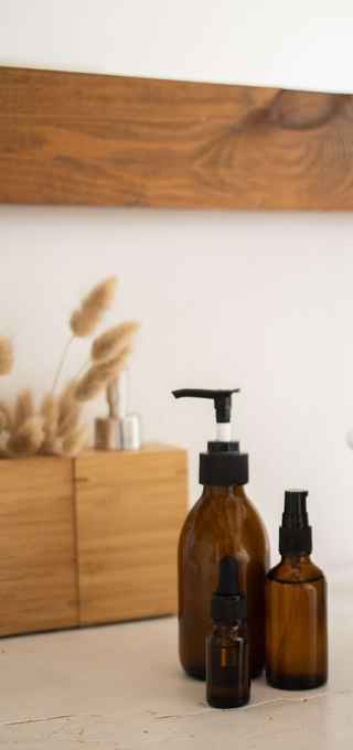 Bottles of skincare on bathroom counter